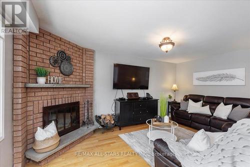 8 Hadera Pl, Georgina, ON - Indoor Photo Showing Living Room With Fireplace
