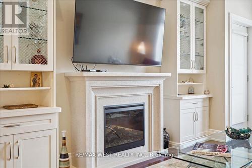 428 - 80 Burns Boulevard, King, ON - Indoor With Fireplace