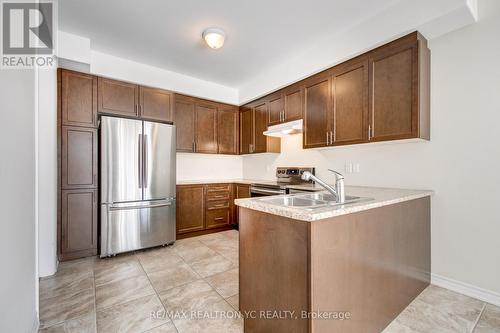 56 Walker Boulevard, New Tecumseth, ON - Indoor Photo Showing Kitchen With Double Sink