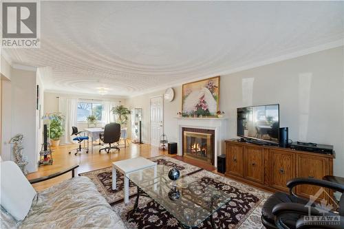 70 Canter Boulevard, Nepean, ON - Indoor Photo Showing Living Room With Fireplace
