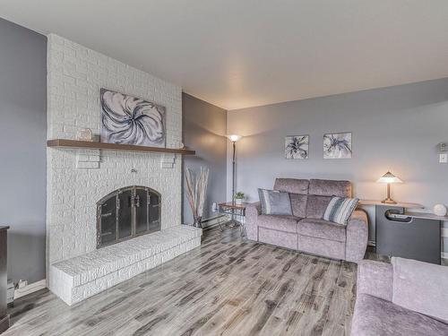 Salon - 500 Rue Laurendeau, Repentigny (Repentigny), QC - Indoor Photo Showing Living Room With Fireplace