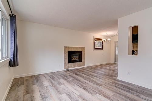 307 Lodgepole Place, Sparwood, BC - Indoor Photo Showing Living Room With Fireplace