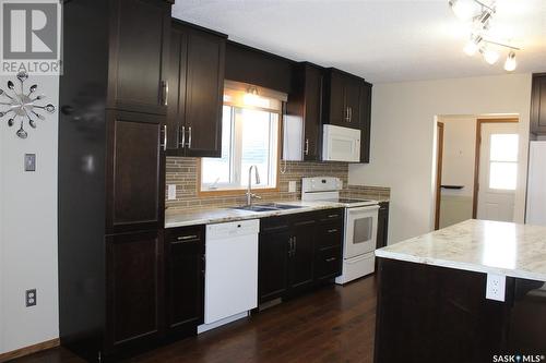 801 Centre Street, Shaunavon, SK - Indoor Photo Showing Kitchen With Double Sink