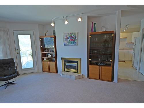 39 - 1220 Mill Street, Nelson, BC - Indoor Photo Showing Other Room With Fireplace