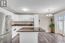 70 103 Banyan Crescent, Saskatoon, SK  - Indoor Photo Showing Kitchen With Double Sink 