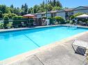 202-1537 Noel Ave, Comox, BC  - Outdoor With In Ground Pool 
