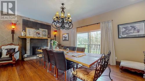 1788 Willowbrook Road, Oliver, BC - Indoor Photo Showing Dining Room With Fireplace