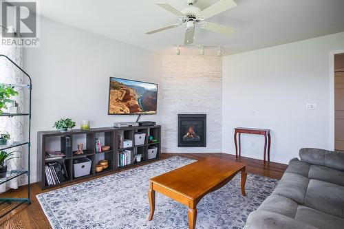 3473 Gates Road, West Kelowna, BC - Indoor Photo Showing Living Room With Fireplace