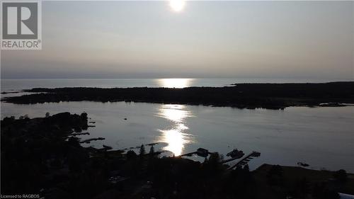 Sunset over Pike Bay - 45 Baywatch Drive, Northern Bruce Peninsula, ON - Outdoor With Body Of Water With View