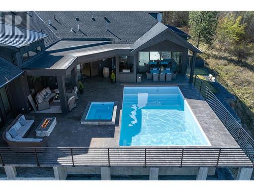 652 Trumpeter Road, Kelowna, BC - Outdoor With In Ground Pool With Deck Patio Veranda
