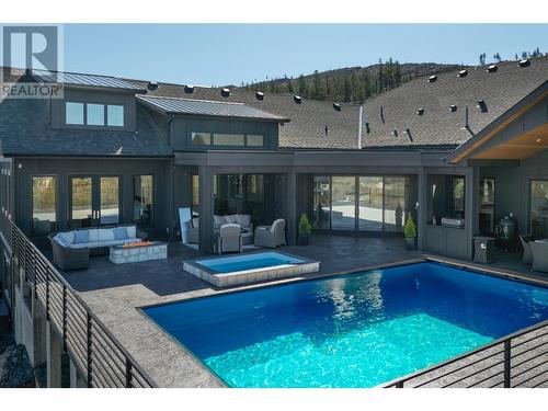 652 Trumpeter Road, Kelowna, BC - Outdoor With In Ground Pool With Deck Patio Veranda