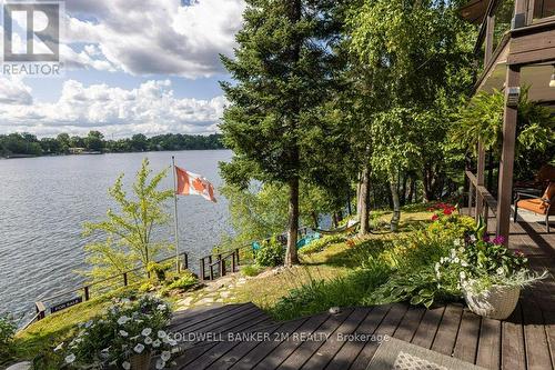 1004 Rocky Shore Lane, South Frontenac, ON - Outdoor With Body Of Water With Deck Patio Veranda With View