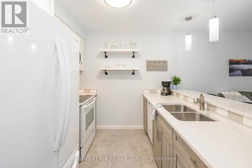 33 - 31 Laguna Parkway, Ramara, ON - Indoor Photo Showing Kitchen With Double Sink