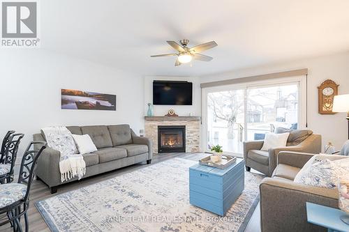 33 - 31 Laguna Parkway, Ramara, ON - Indoor Photo Showing Living Room With Fireplace