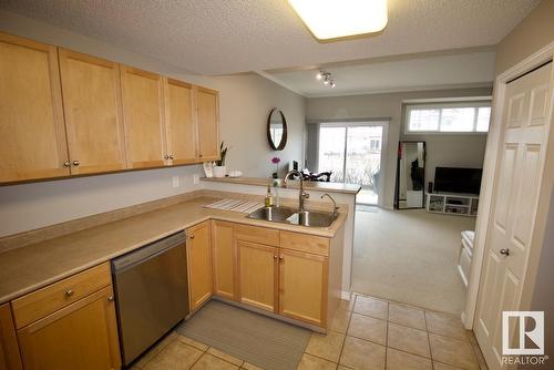 #4 1179 Summerside Dr Sw, Edmonton, AB - Indoor Photo Showing Kitchen With Double Sink