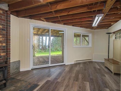 331 Edgeware Rd, Quadra Island, BC - Indoor Photo Showing Other Room With Fireplace
