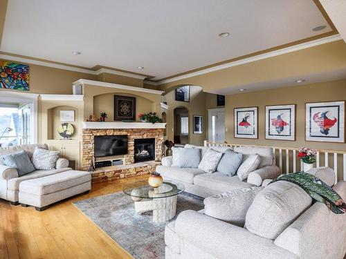 558 Middleton Way, Coldstream, BC - Indoor Photo Showing Living Room With Fireplace