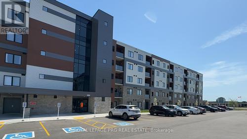 409 - 2550 Sandwich Parkway W, Windsor, ON - Outdoor With Balcony With Facade