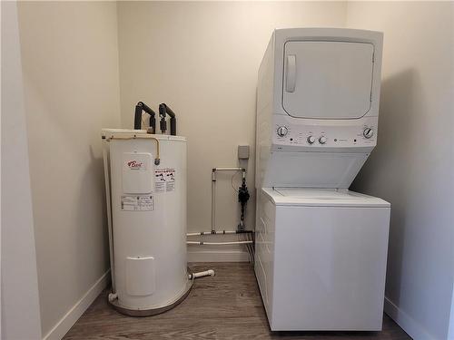 340 4Th Avenue Ne, Portage La Prairie, MB - Indoor Photo Showing Laundry Room