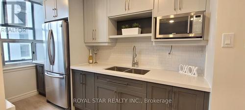 #1911 -25 Kensington Rd, Brampton, ON - Indoor Photo Showing Kitchen With Double Sink With Upgraded Kitchen