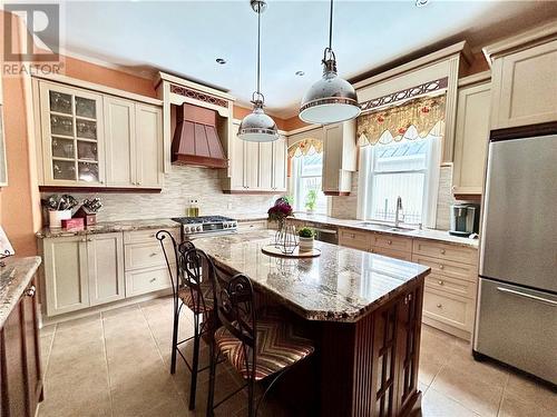 Beautiful kitchen with large island and granite countertops - 536 St Lawrence Street, Winchester, ON - Indoor Photo Showing Kitchen