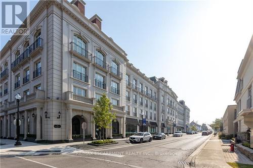 #206 -300 Randall St, Oakville, ON - Outdoor With Facade