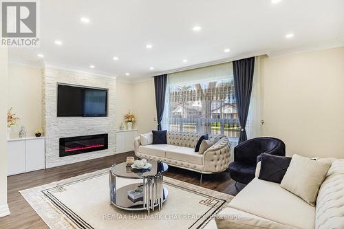 7 Harefield Dr, Toronto, ON - Indoor Photo Showing Living Room With Fireplace