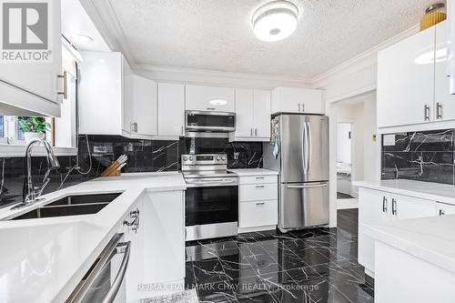 7 Harefield Dr, Toronto, ON - Indoor Photo Showing Kitchen With Double Sink