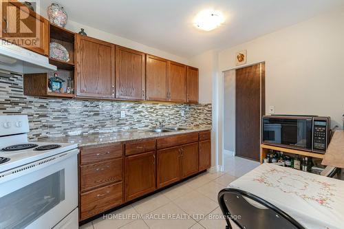#809 -335 Driftwood Ave, Toronto, ON - Indoor Photo Showing Kitchen With Double Sink