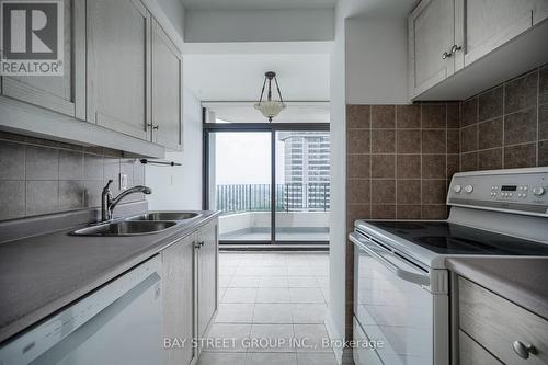 1710 - 1333 Bloor Street N, Mississauga, ON - Indoor Photo Showing Kitchen With Double Sink