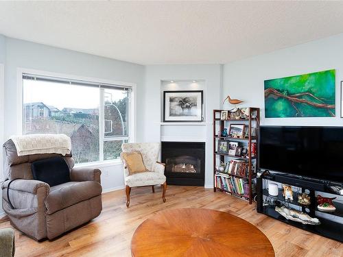 305-4965 Vista View Cres, Nanaimo, BC - Indoor Photo Showing Living Room With Fireplace