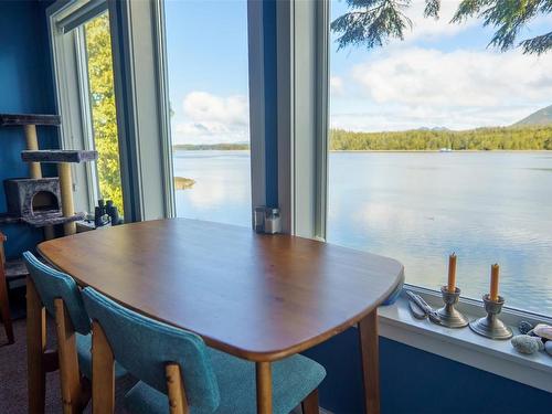 706-1971 Harbour Dr, Ucluelet, BC - Indoor Photo Showing Dining Room With Body Of Water
