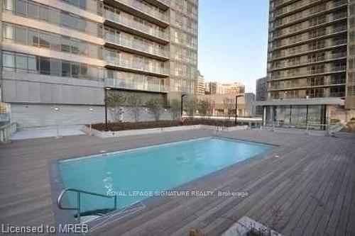2401-65 Bremner Blvd, Toronto, ON - Outdoor With In Ground Pool