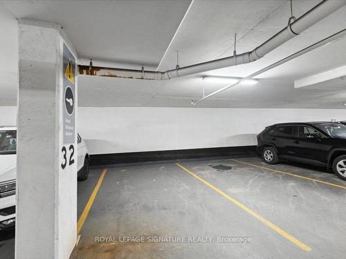 2106-5 Michael Power Pl, Toronto, ON - Indoor Photo Showing Garage