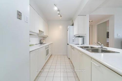 904-50 Eglinton Ave, Mississauga, ON - Indoor Photo Showing Kitchen With Double Sink
