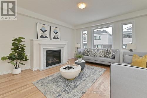 Upper - 46 Bannister Road, Barrie, ON - Indoor Photo Showing Living Room With Fireplace