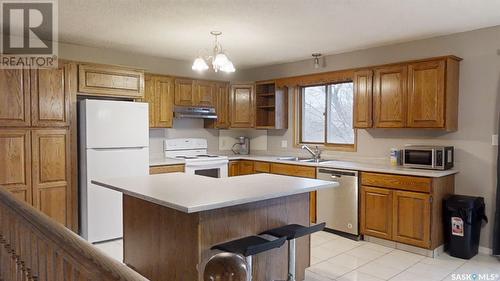 15 Frere Street, Kindersley, SK - Indoor Photo Showing Kitchen With Double Sink