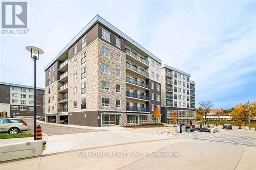 H607 - 275 Larch Street, Waterloo, ON - Outdoor With Facade