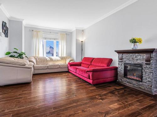 Salon - 161 Rue Des Abbesses, Vaudreuil-Dorion, QC - Indoor Photo Showing Living Room With Fireplace