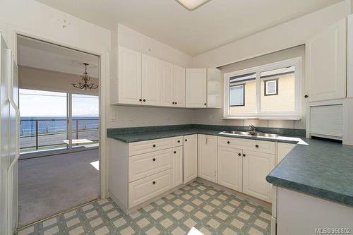 201-1488 Dallas Rd, Victoria, BC - Indoor Photo Showing Kitchen With Double Sink