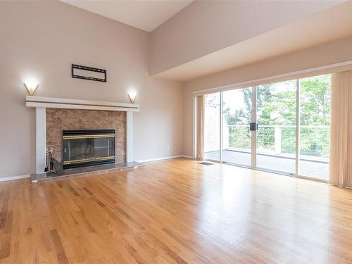 4403 Emily Carr Dr, Saanich, BC - Indoor Photo Showing Living Room With Fireplace