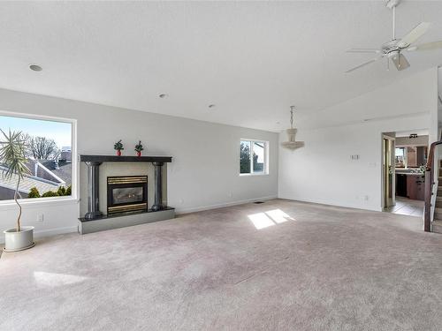 4268 Westervelt Pl, Saanich, BC - Indoor Photo Showing Living Room With Fireplace