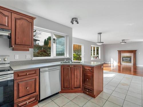4268 Westervelt Pl, Saanich, BC - Indoor Photo Showing Kitchen With Double Sink