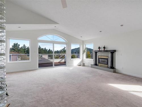4268 Westervelt Pl, Saanich, BC - Indoor Photo Showing Other Room With Fireplace