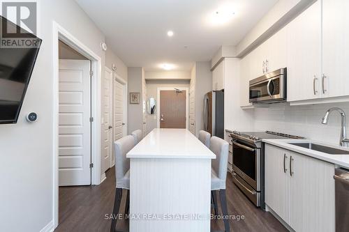 #208 -1105 Leger Way E, Milton, ON - Indoor Photo Showing Kitchen With Stainless Steel Kitchen With Upgraded Kitchen
