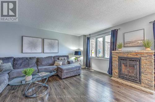 #224 -230 Clarke Rd, London, ON - Indoor Photo Showing Living Room With Fireplace