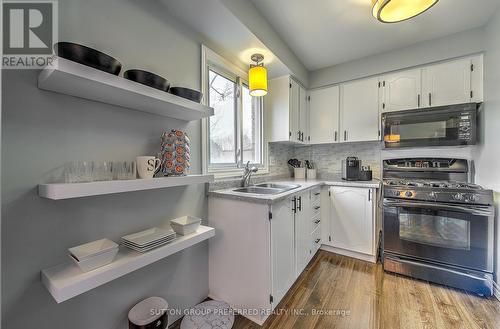 #224 -230 Clarke Rd, London, ON - Indoor Photo Showing Kitchen With Double Sink
