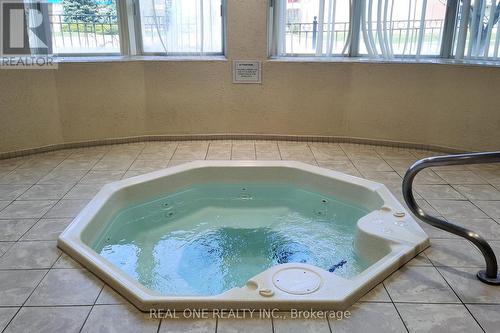 #1704 -4879 Kimbermount Ave, Mississauga, ON - Indoor Photo Showing Other Room With In Ground Pool