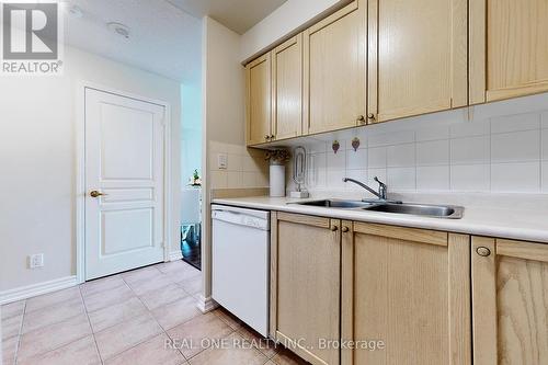 #1704 -4879 Kimbermount Ave, Mississauga, ON - Indoor Photo Showing Kitchen With Double Sink