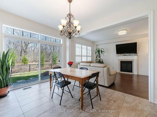 197 Thornbush Blvd, Brampton, ON - Indoor Photo Showing Dining Room With Fireplace